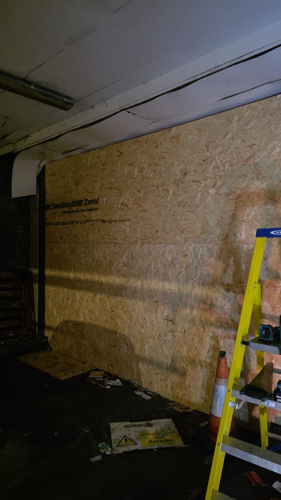 Large wall board-up in progress overnight — LT Lockworks South London