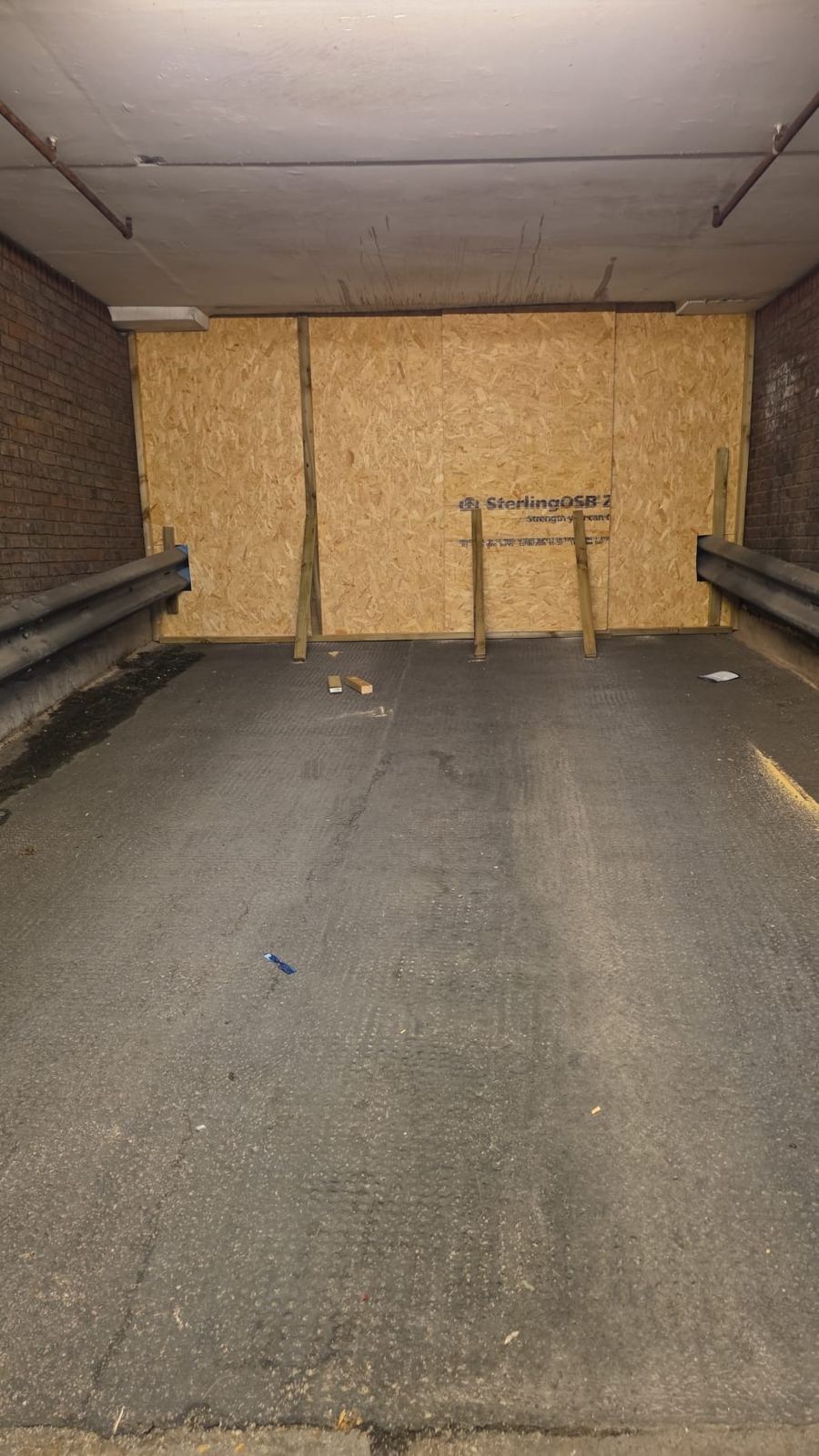 OSB boards fixed across car park ramp — LT Lockworks